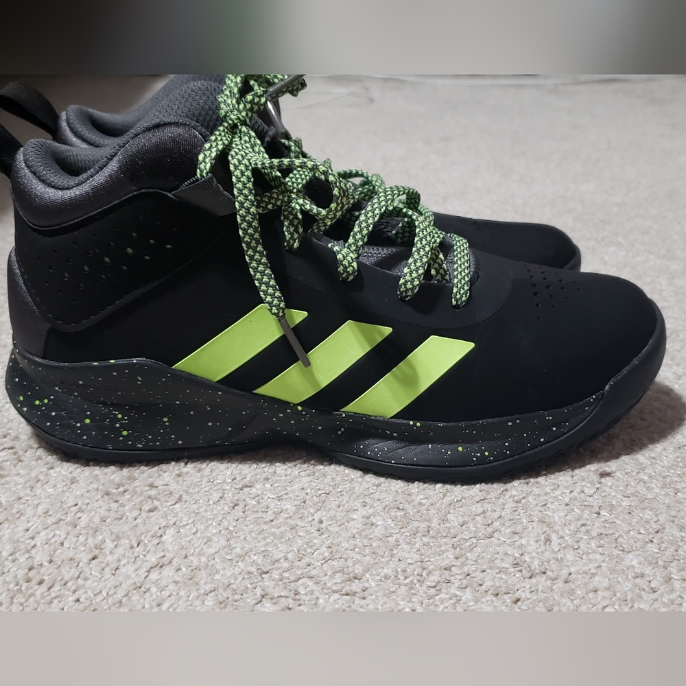 Boys Adidas basketball shoes.